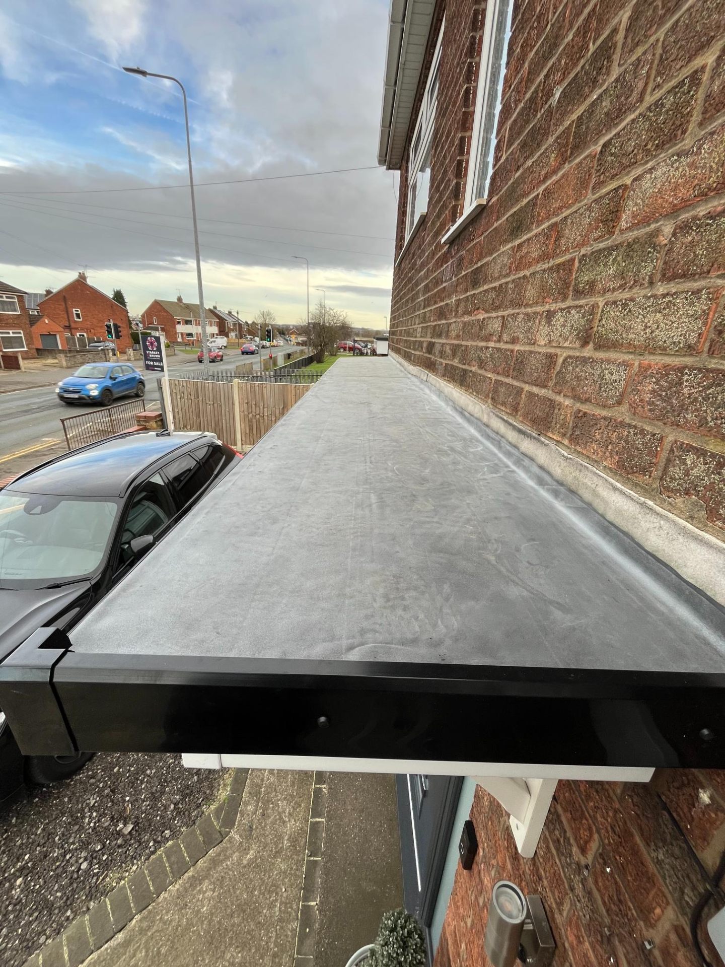 EPDM rubber flat roof over porch
