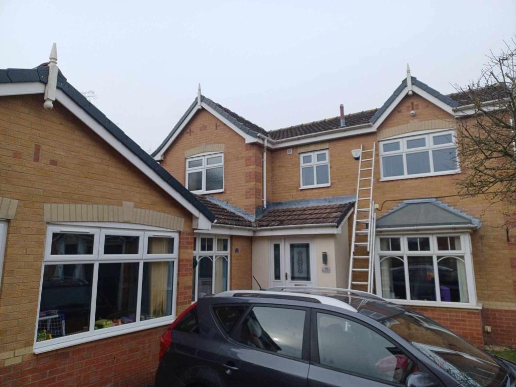 Completed gable end with new fascias and soffits