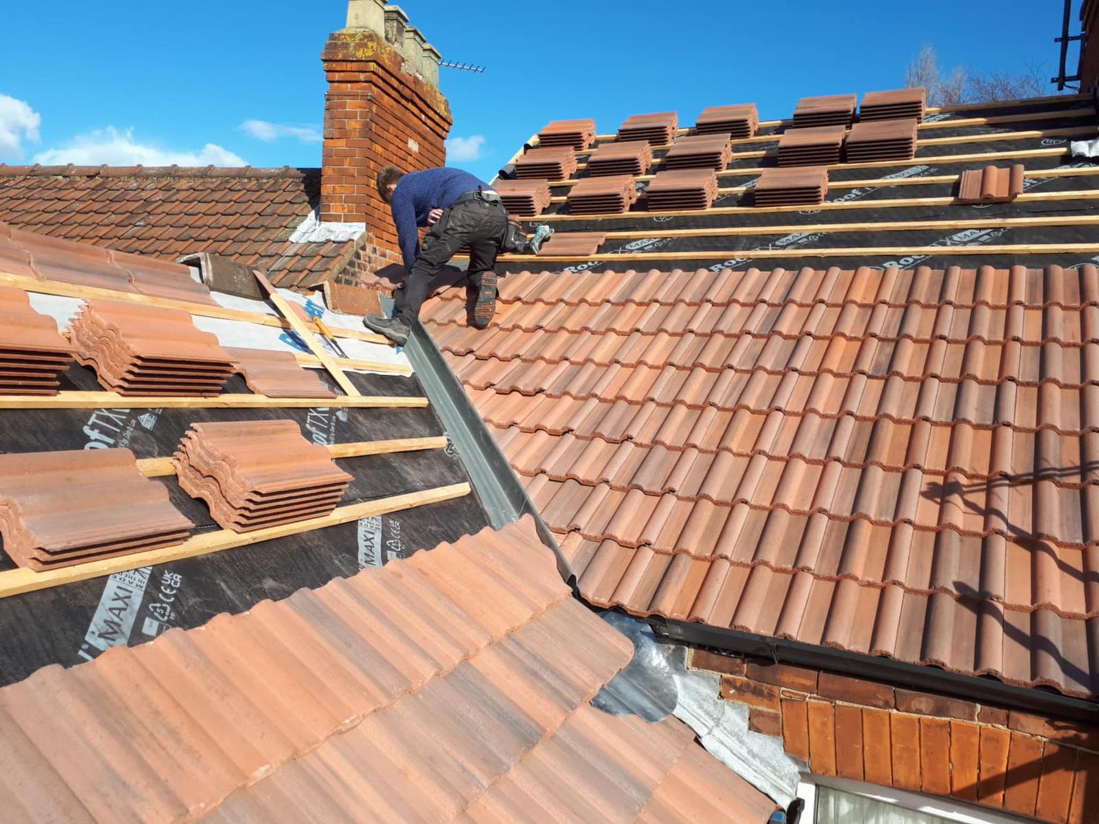 Full re-roof in progress with new battens and membrane